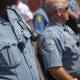 Ferguson, Mo., police officers wear body cameras during a rally Aug. 30, 2014, in the aftermath of the fatal police shooting of unarmed teen Michael Brown.
Aaron P. Bernstein/Getty Images